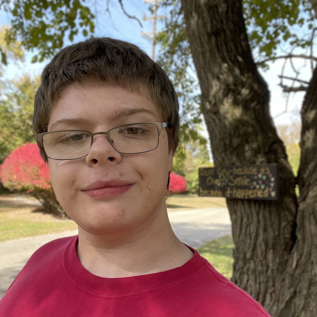 A photo of Daniel behind a scenic environment