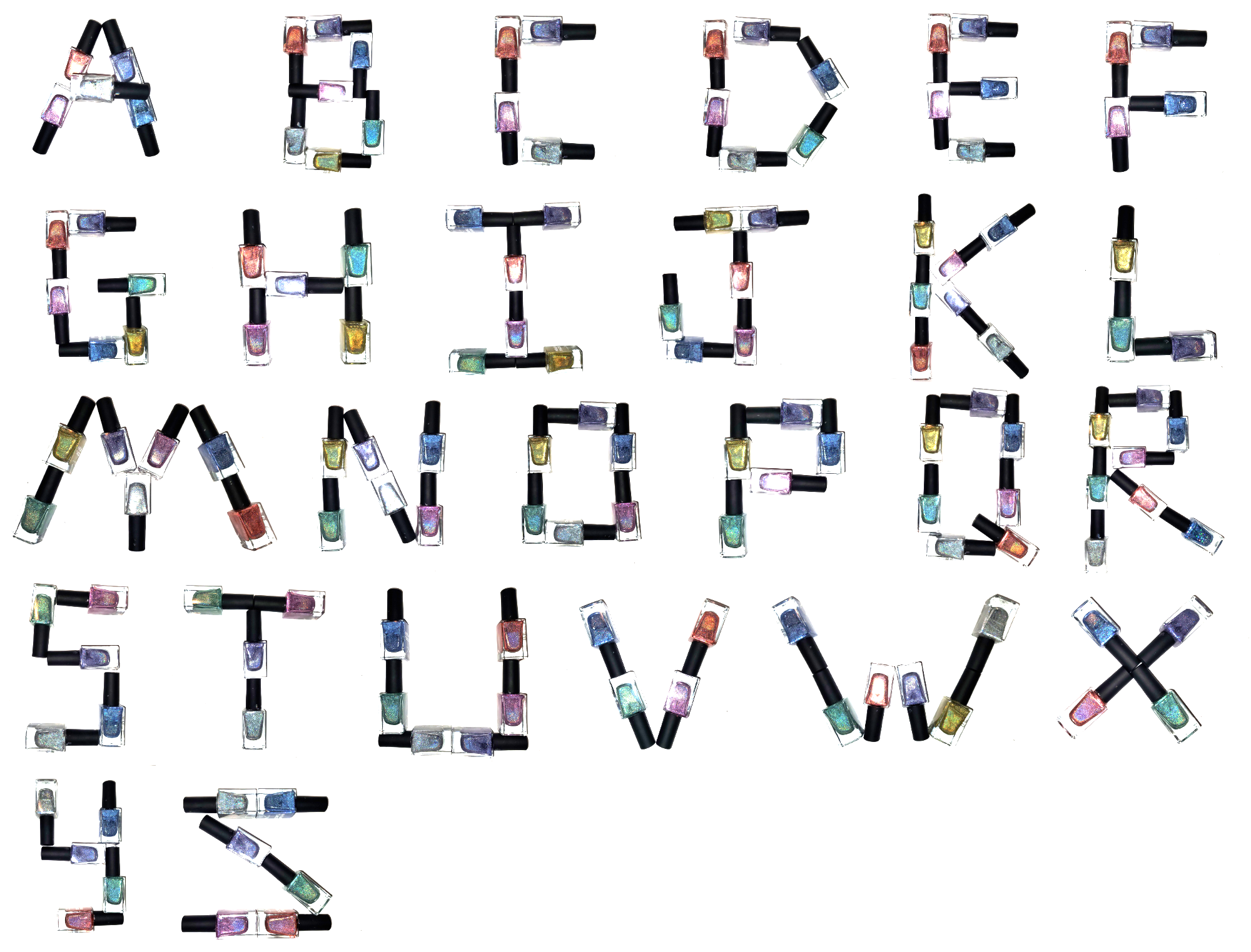 Photo of nail polish bottles arranged into the letters of the alphabet