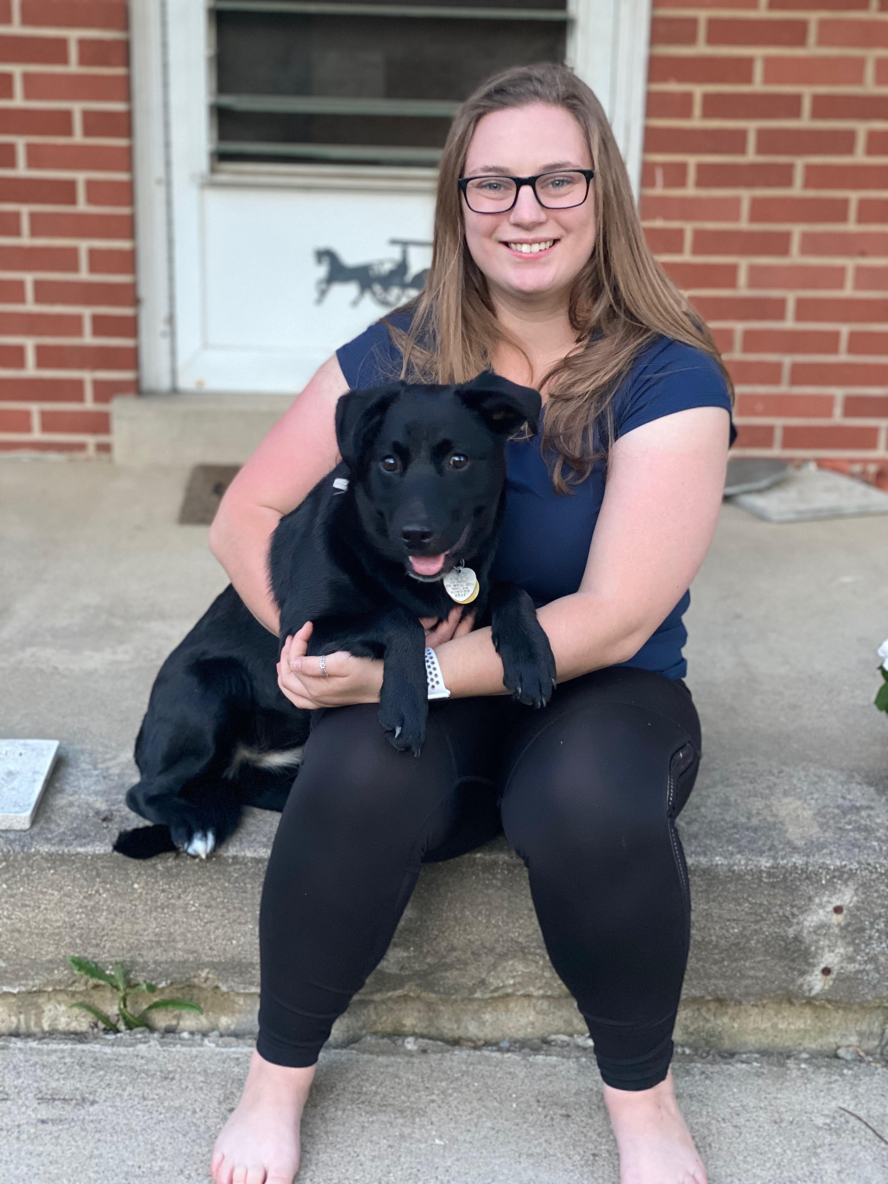 Morgan with Lucy on front porch